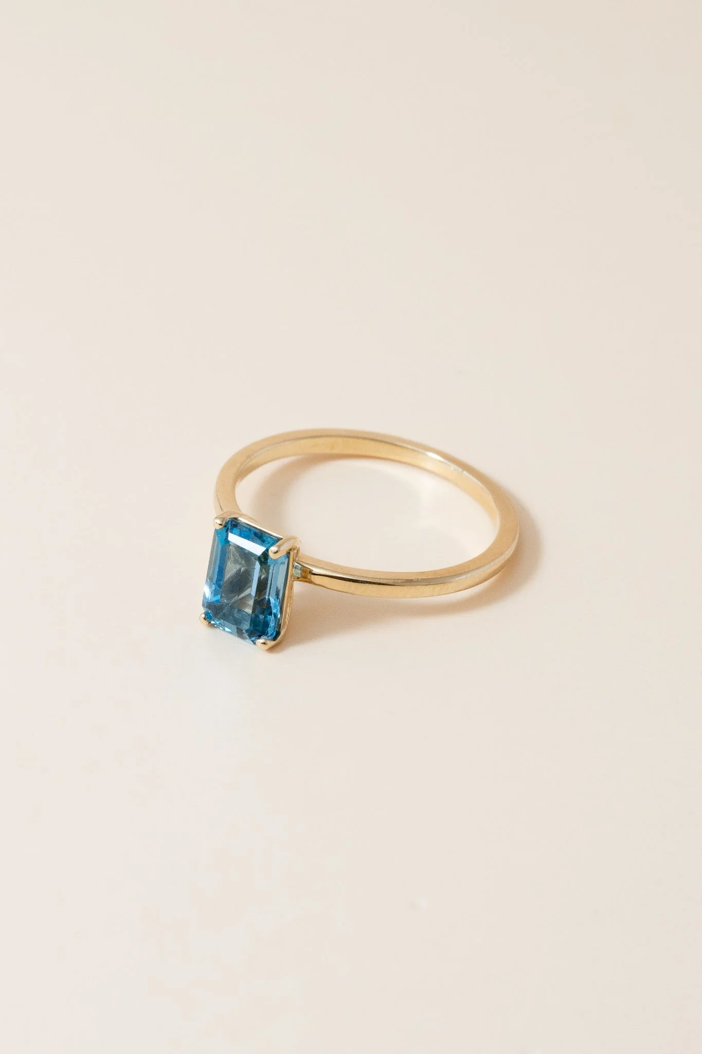 14K Emerald Cut Blue Topaz Solitaire Ring - Image 3