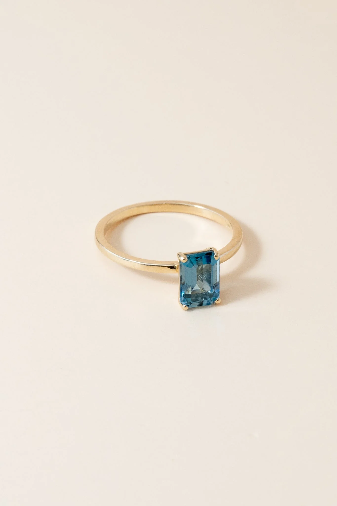 14K Emerald Cut Blue Topaz Solitaire Ring - Image 4