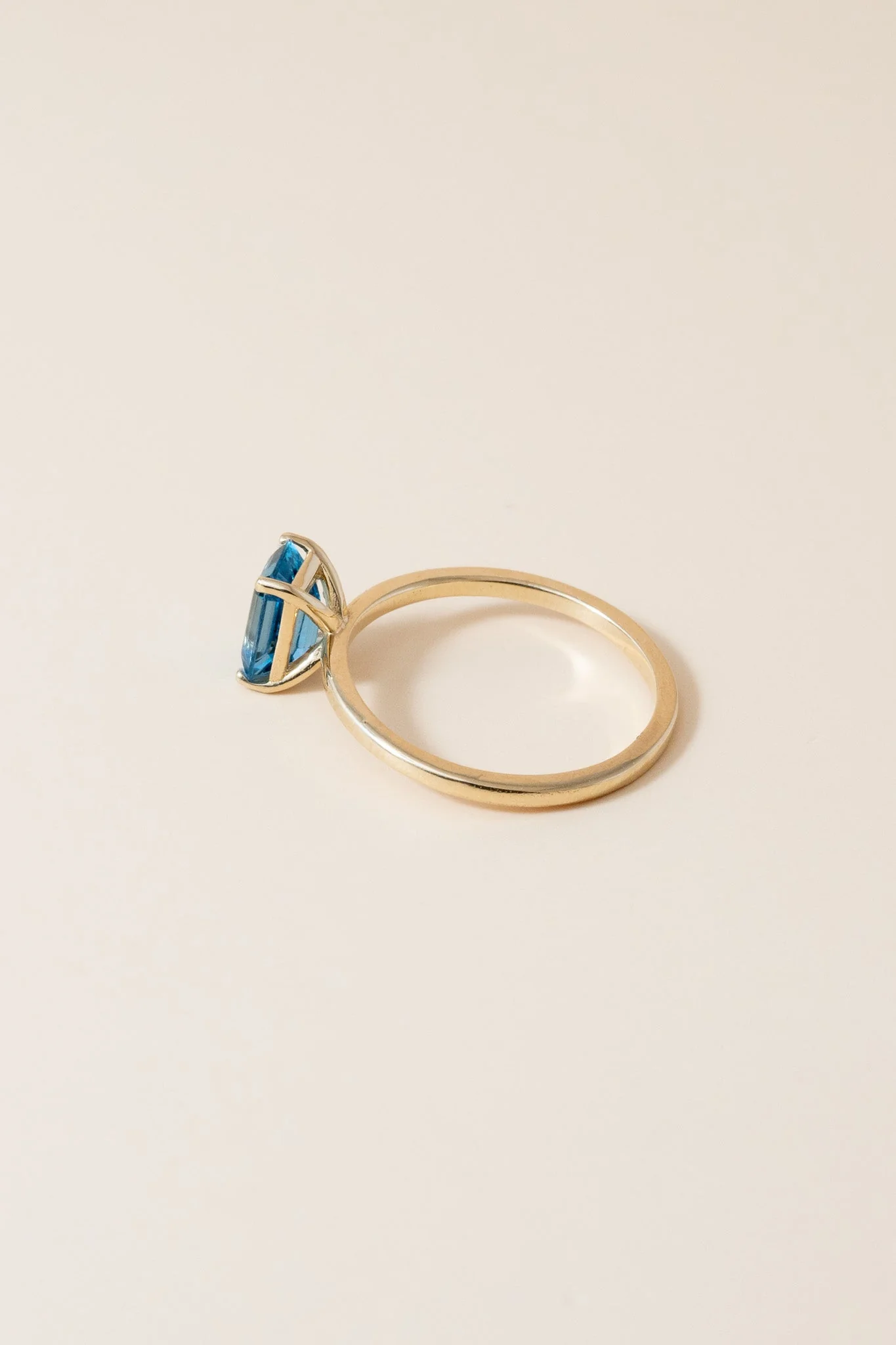 14K Emerald Cut Blue Topaz Solitaire Ring - Image 5