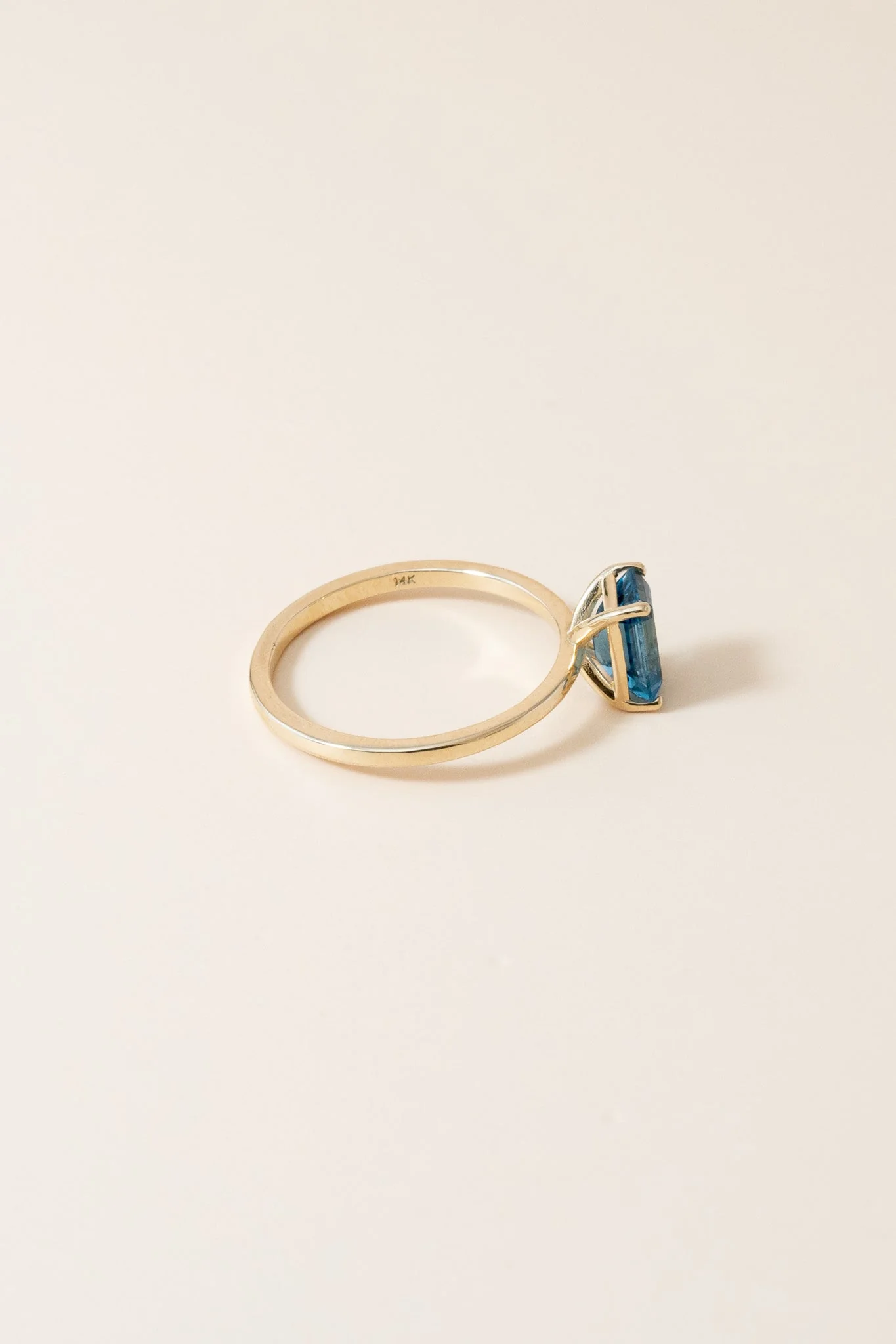 14K Emerald Cut Blue Topaz Solitaire Ring - Image 6